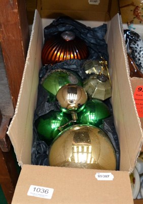 Lot 1036 - A collection of witches balls and early Christmas decorations