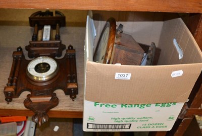 Lot 1037 - A cuckoo clock, wall clock and barometer