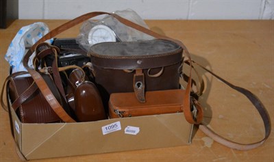 Lot 1095 - A Kodak Retina Cuplari TINA IIIS camera in leather case; a Eumig servomatic cine camera, cased;...