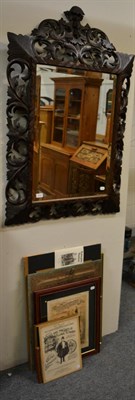 Lot 1133 - A carved oak mirror with bevelled rectangular mirror plate and a miscellaneous group of prints