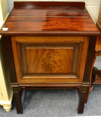 Lot 1140 - A mahogany drinks cabinet with hinged top and fall front