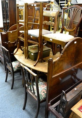 Lot 1156 - An oak gate leg dining table, a set of three shield back chairs, rocking chair, three further...