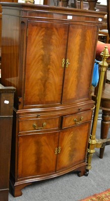 Lot 1168 - A reproduction mahogany cocktail cabinet