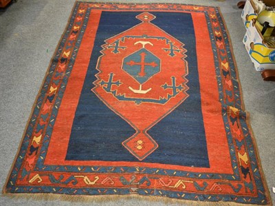 Lot 1172 - Kazak rug, Central Caucasus, circa 1920, the indigo field centred by a sawtooth medallion framed by