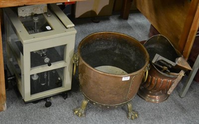 Lot 1174 - A 19th century brass and copper log bin, ring and lion mask handles, paw feet, etc