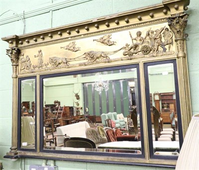 Lot 1232 - A Regency gilt framed, inverted breakfront sectional mirror with ebonised slips and bevelled plates