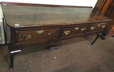 Lot 1233 - A George III oak dresser base