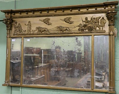 Lot 1242 - A Regency inverted breakfront gilt sectional mirror