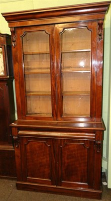 Lot 1246 - A Victorian mahogany glazed bookcase cabinet