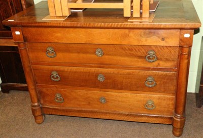 Lot 1254 - An early 19th century French empire walnut chest of drawers&nbsp