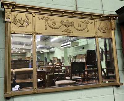 Lot 1259 - A Regency gilt framed sectional over mantel mirror