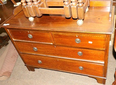 Lot 1266 - An inlaid mahogany three height chest of drawers