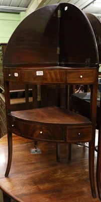 Lot 1273 - A George III mahogany corner washstand