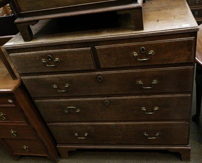 Lot 1274 - A George III oak four height chest of drawers