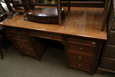 Lot 1277 - A pitch pine nine drawer kneehole desk, with makers stamp Appleyard & Sons of Rotherham