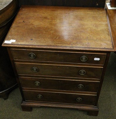 Lot 1291 - A George III mahogany four height chest of drawers of small proportions