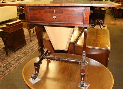 Lot 1296 - A 19th century drop leaf mahogany work table