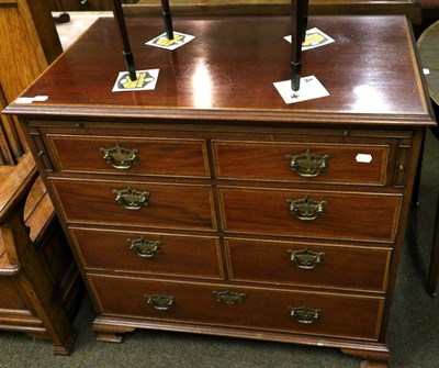 Lot 1298 - An inlaid mahogany chest of drawers, with three pairs of short drawers over a long base drawer,...