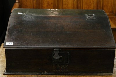 Lot 1306 - An 18th century provincial oak bible box, carved with the initials M.R