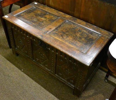 Lot 1313 - An 18th century oak three panelled coffer