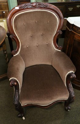 Lot 1318 - A Victorian carved mahogany framed button back armchair