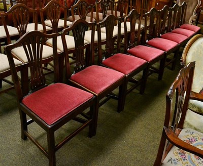 Lot 1331 - A set of six oak Hepplewhite country dining chairs together with a pair of similar chairs, all with