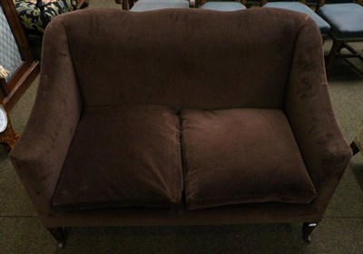 Lot 1337 - An Edwardian two seater sofa upholstered in chocolate brown corduroy