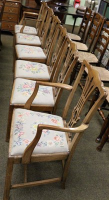 Lot 1339 - A set of six 18th century style oak dining chairs, including two carvers each with drop in...