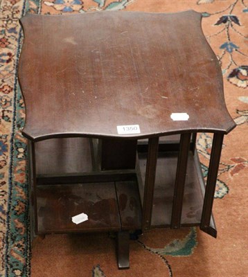 Lot 1350 - A mahogany revolving table top bookcase