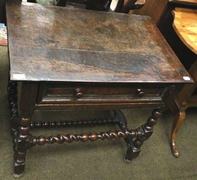 Lot 1360 - An 18th century provincial oak side table fitted with a drawer