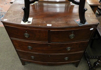 Lot 1362 - A George III mahogany bow fronted three height chest of drawers