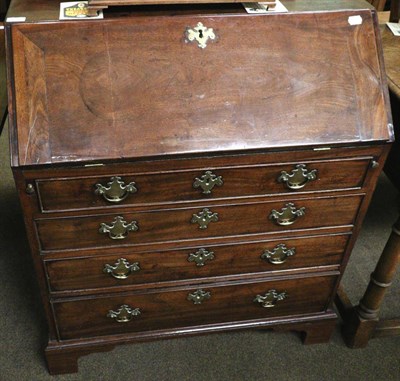 Lot 1367 - A George III mahogany bureau