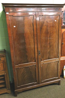 Lot 1384 - A mahogany double wardrobe