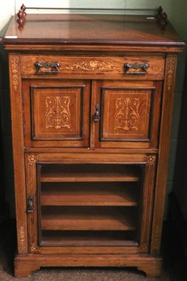 Lot 1385 - An inlaid music cabinet