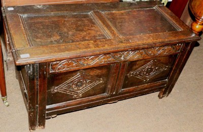 Lot 1401 - An oak coffer, with lozenge carved two panel front