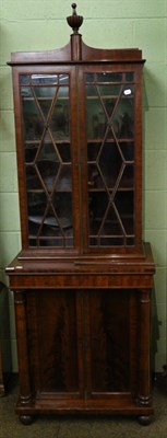 Lot 1405 - A mid 19th century mahogany astragal glazed bookcase cabinet