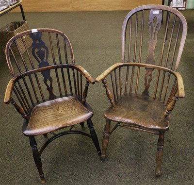 Lot 1416 - An oak and elm Windsor armchair, together with another similar example with a crinolene stretcher