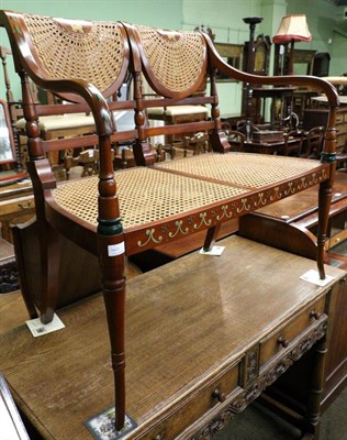 Lot 1421 - A satinwood two seater settee