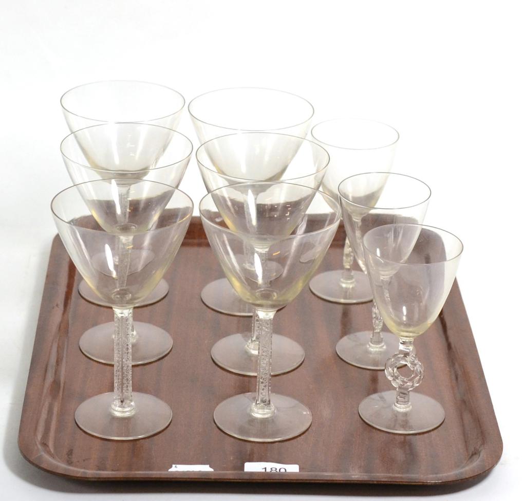 Lot 180 - A set of six Lalique wine glasses, signed 'R Lalique France'; together with three smaller...