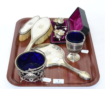 Lot 1 - A small group of silver comprising a cased pair of salts, two sugar bowls, two dressing table...