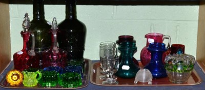 Lot 55 - Assorted coloured and other glassware, including cranberry claret jugs, furniture stands,...