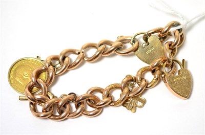 Lot 86 - A charm bracelet with a sovereign