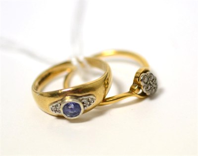 Lot 88 - A 9ct gold sapphire and diamond ring and a diamond crossover ring
