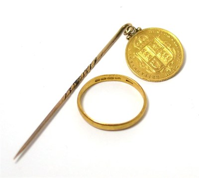 Lot 98 - A 22ct gold wedding band and an 1887 half sovereign converted as a tie pin