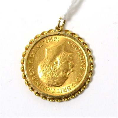 Lot 117 - A full sovereign dated 1912, in a 9ct gold setting