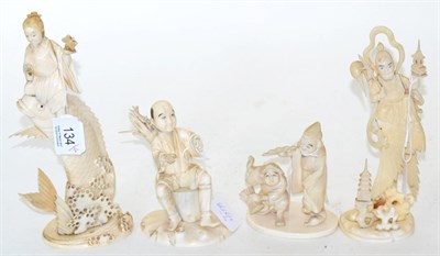 Lot 134 - A group of four ivory okimonos, Meiji period