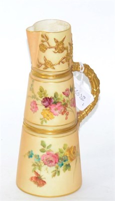 Lot 135 - A Royal Worcester blush ground ewer, of tapered form, floral decoration, gilt embellished,...