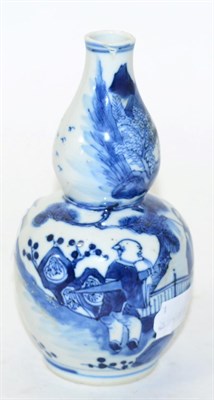 Lot 140 - A Chinese blue and white porcelain double gourd vase, Ching dynasty