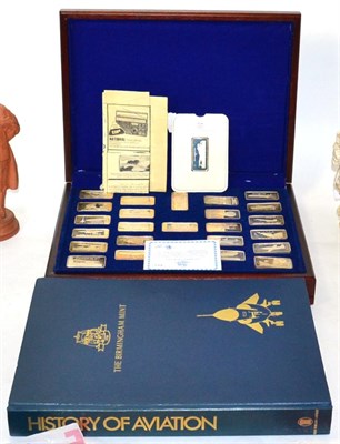 Lot 147 - Birmingham mint - milestones of manned flight together with a book