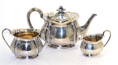 Lot 171 - A silver three piece tea service